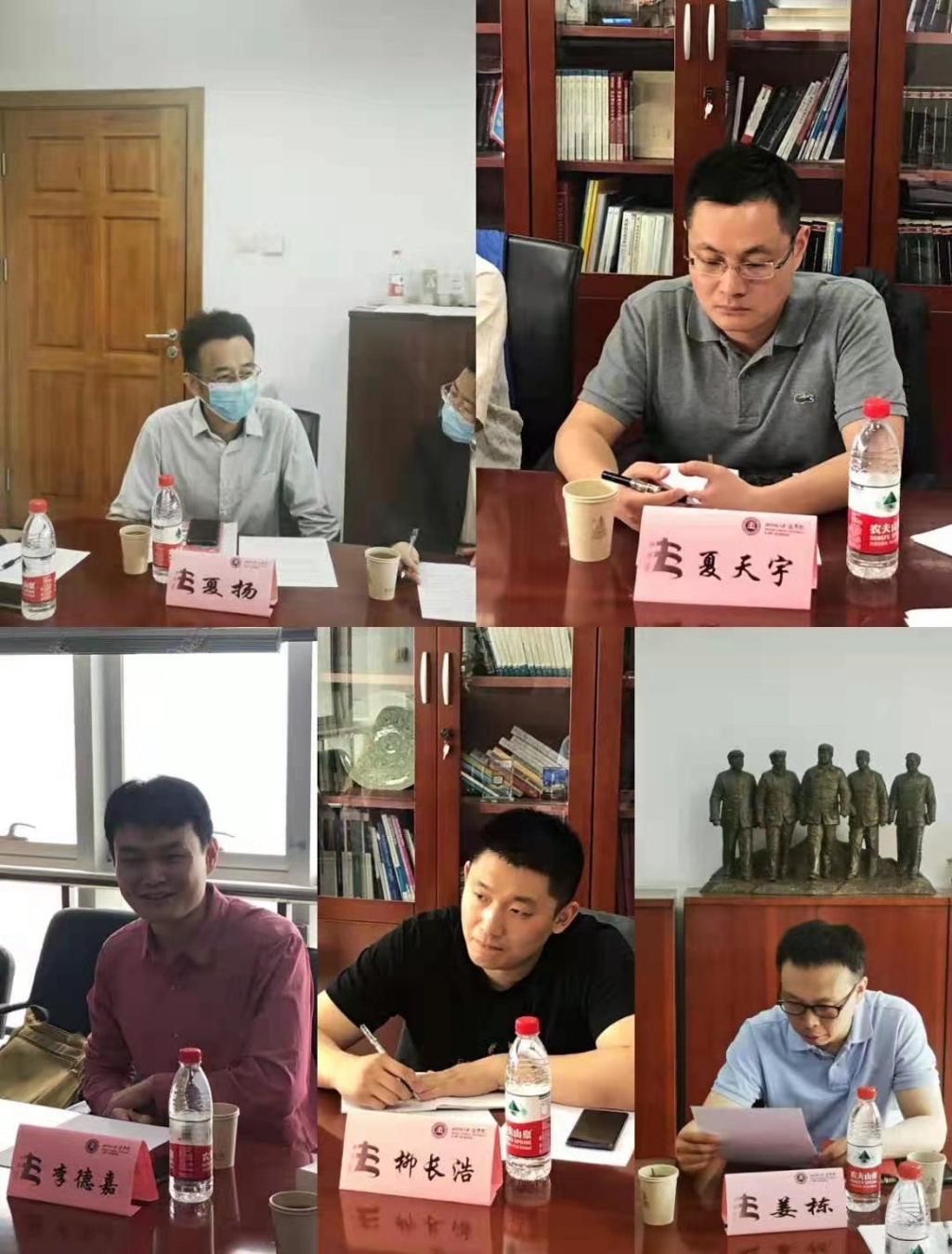 一群人坐在桌子前

描述已自动生成